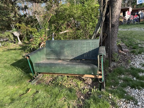Antique metal porch glider